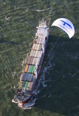 Container ship being towed by a massive power kite