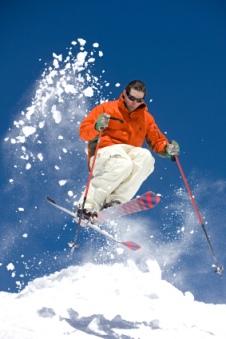 skier racing down the snow